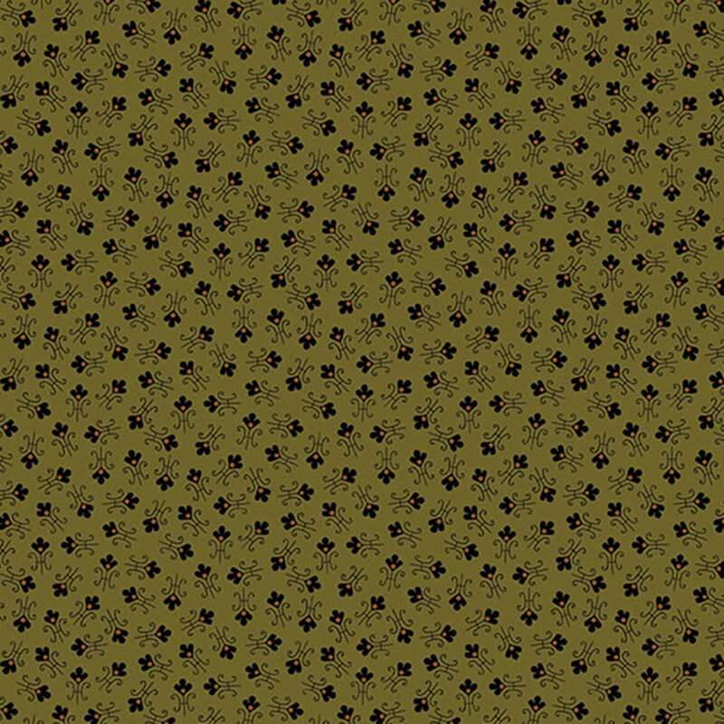 Green fabric with tossed abstract floral shapes.