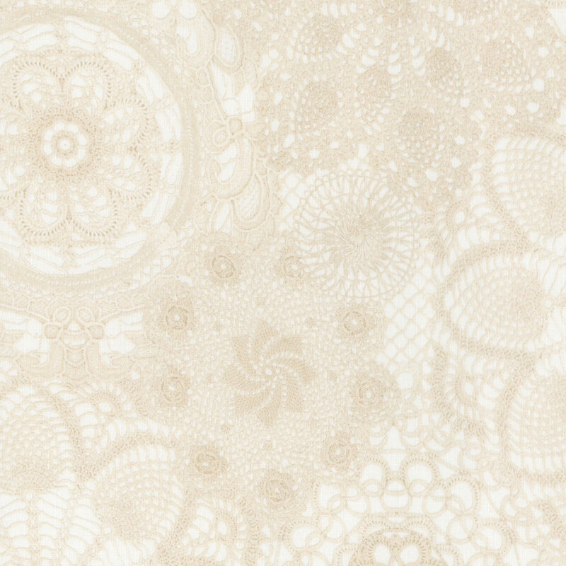 Cream fabric featuring an intricate lace design with floral motifs