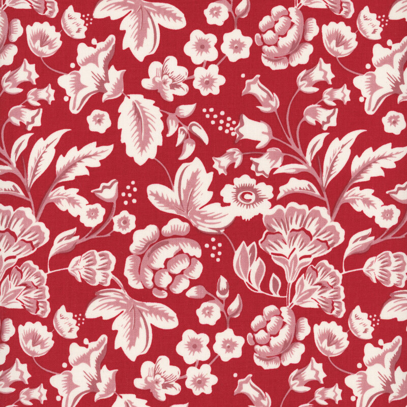 Red fabric with sprawling illustrations of pink and white leaves and flowers.