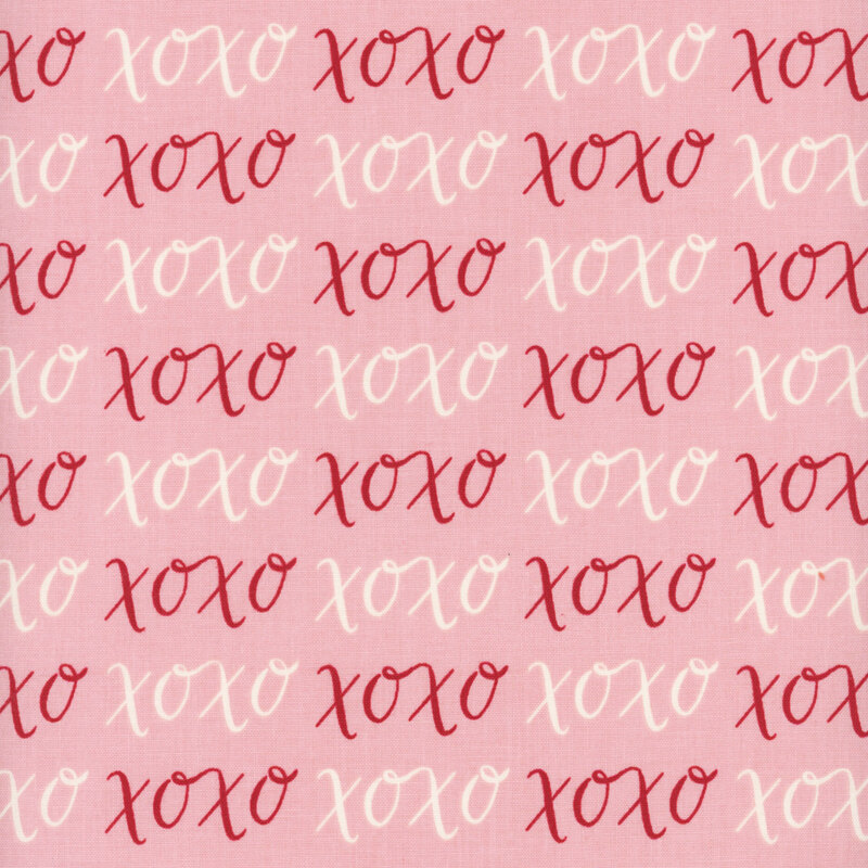 Pink fabric with white and red XOXO's.
