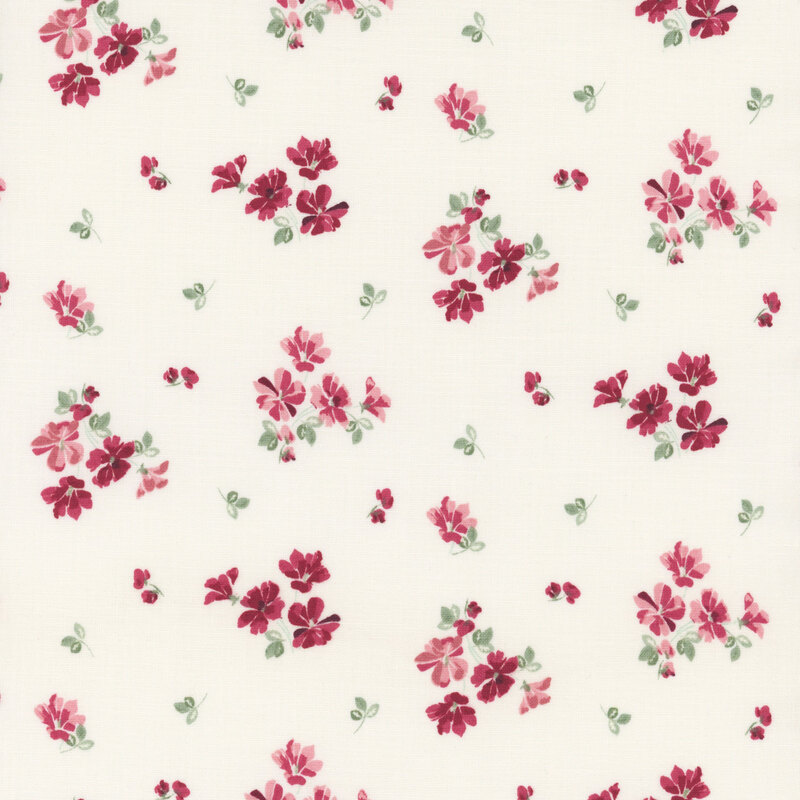 Floral pattern featuring small red and pink flowers with green leaves on a cream fabric.