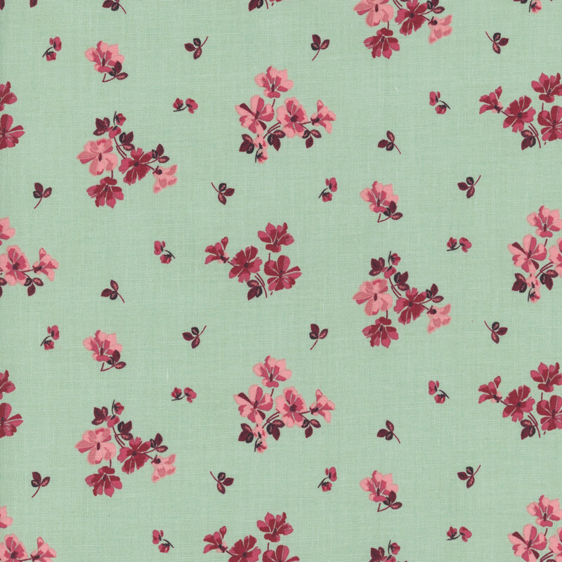 Repeating pattern of pink and red flowers on a soft mint green fabric.