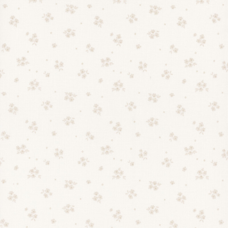 Light beige fabric with a subtle pattern of small, scattered floral motifs.