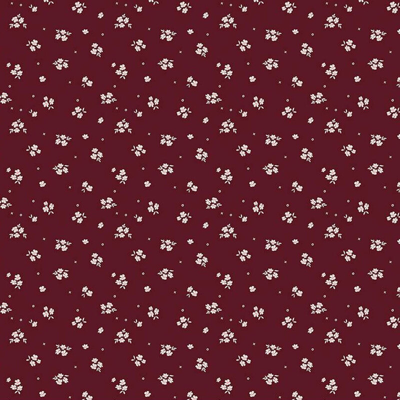 Burgundy fabric with a scattered white floral fabric.