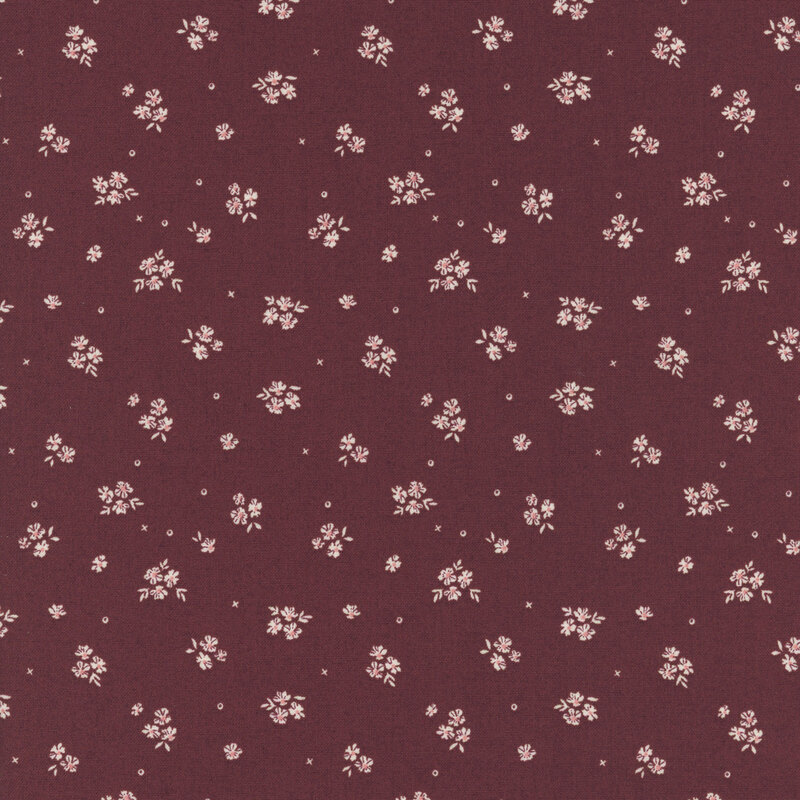 Burgundy fabric with a scattered white floral fabric.