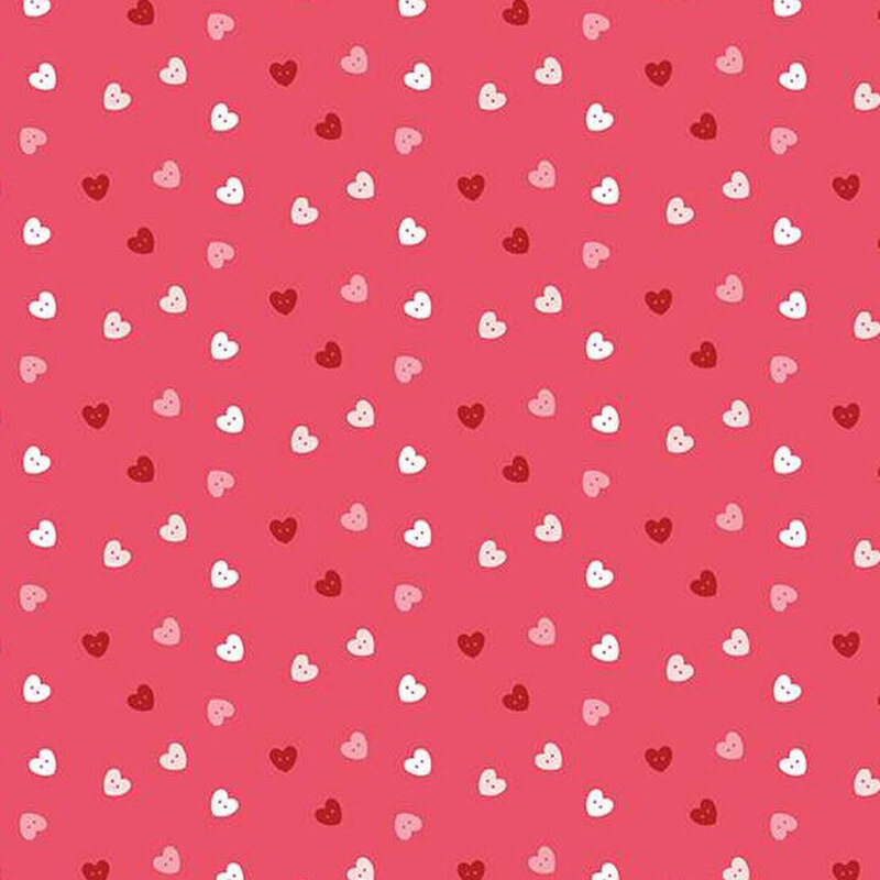 fabric pattern of pink, red, and white hearts scattered all over a deep pink background