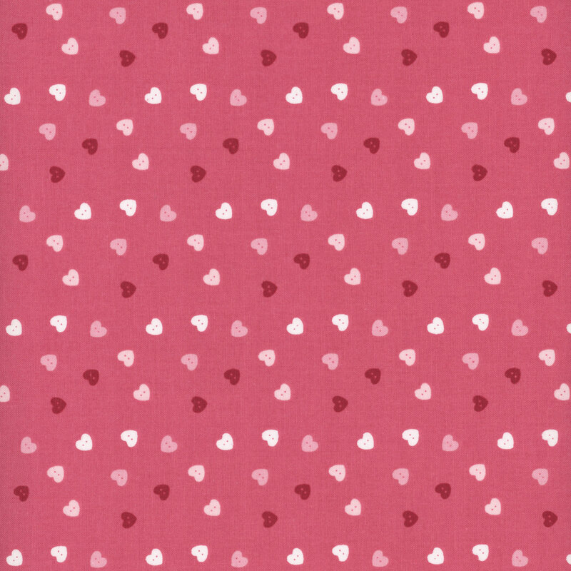 fabric pattern of pink, red, and white hearts scattered all over a deep pink background