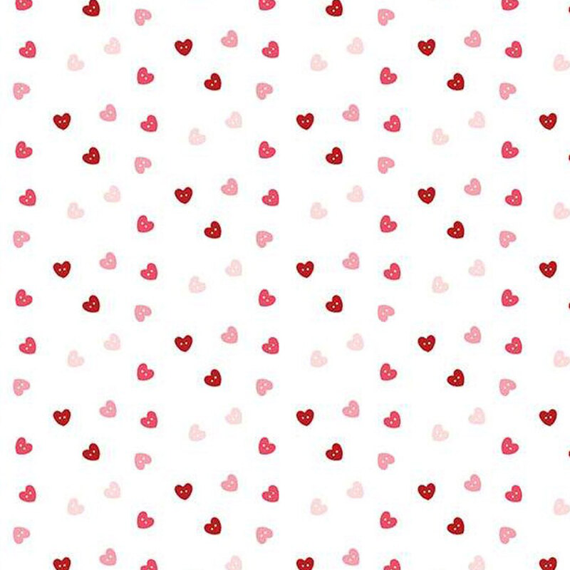 fabric pattern of pink, red, and white hearts scattered all over a white pink background