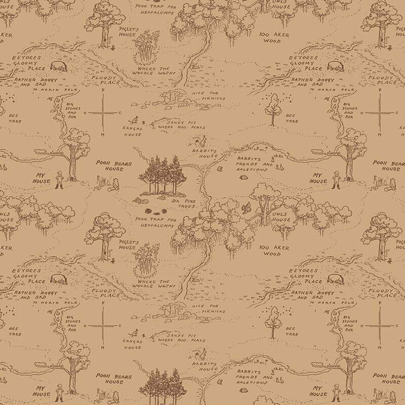 A fabric featuring a hand-drawn map with trees, paths, and labeled locations.