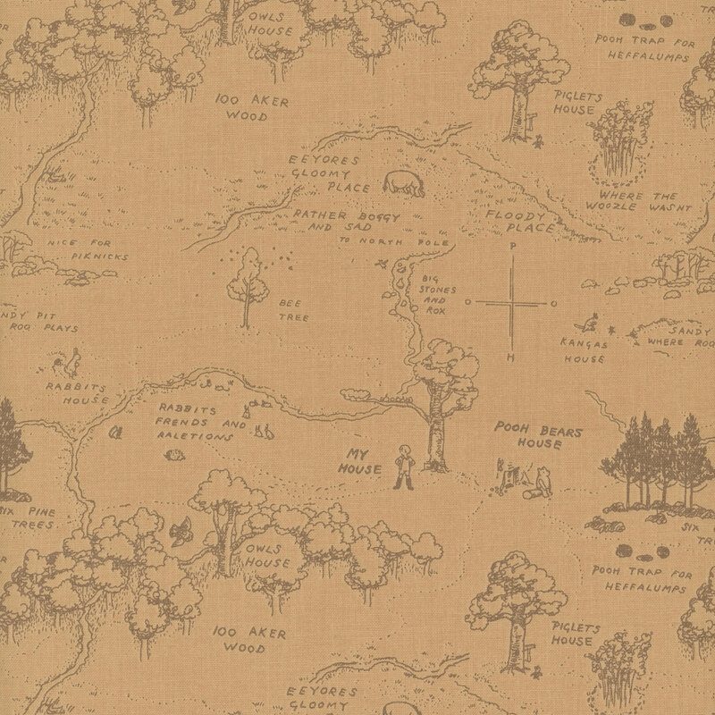 A brown fabric featuring a hand-drawn map of 100 acre woods with trees, paths, and labeled locations.