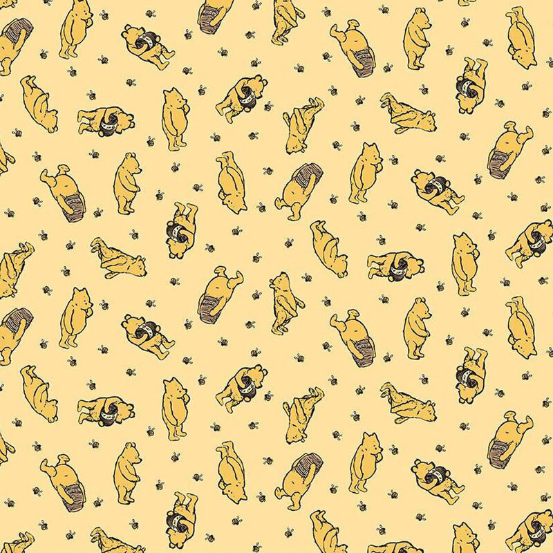 A repeating pattern of Winnie the Pooh illustrations on a pale yellow fabric.