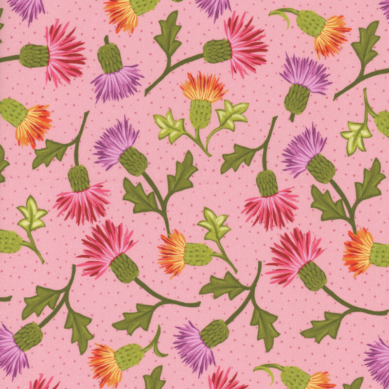 Pink fabric with subtle dots tossed with purple, pink, and orange flowers 