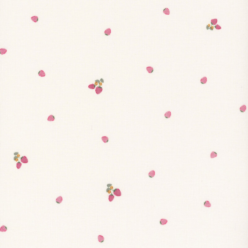 Individual and clusters of strawberries tossed on a light cream background.
