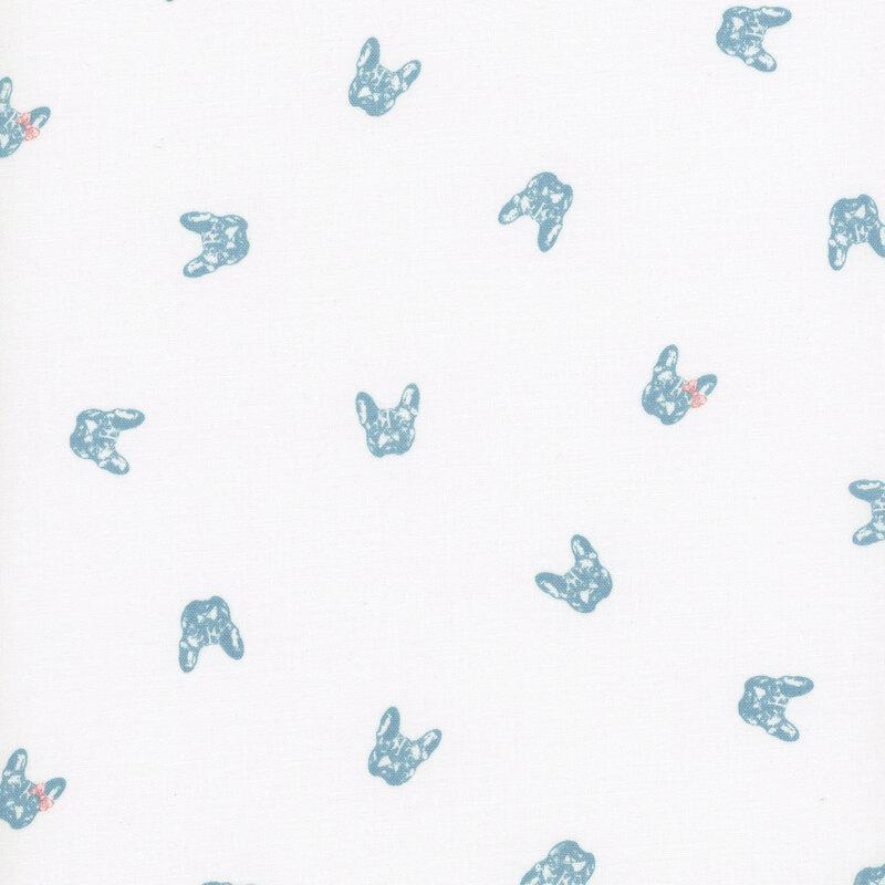 Ditsy french bulldog heads tossed on an off white background.