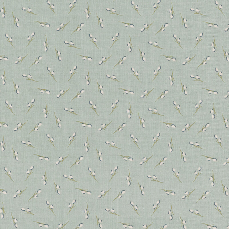 Dull blue fabric with tossed sprigs of blossoms and leaves.