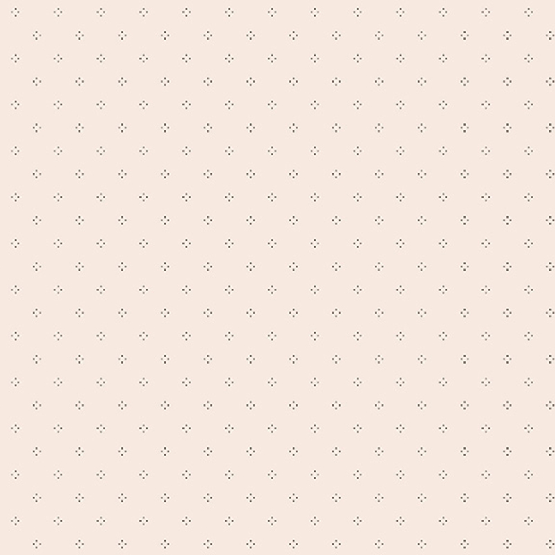 Cream fabric with simple pinprick dotted designs.