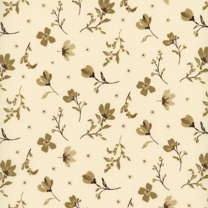 fabric pattern of white florals scattered all over a cream background.