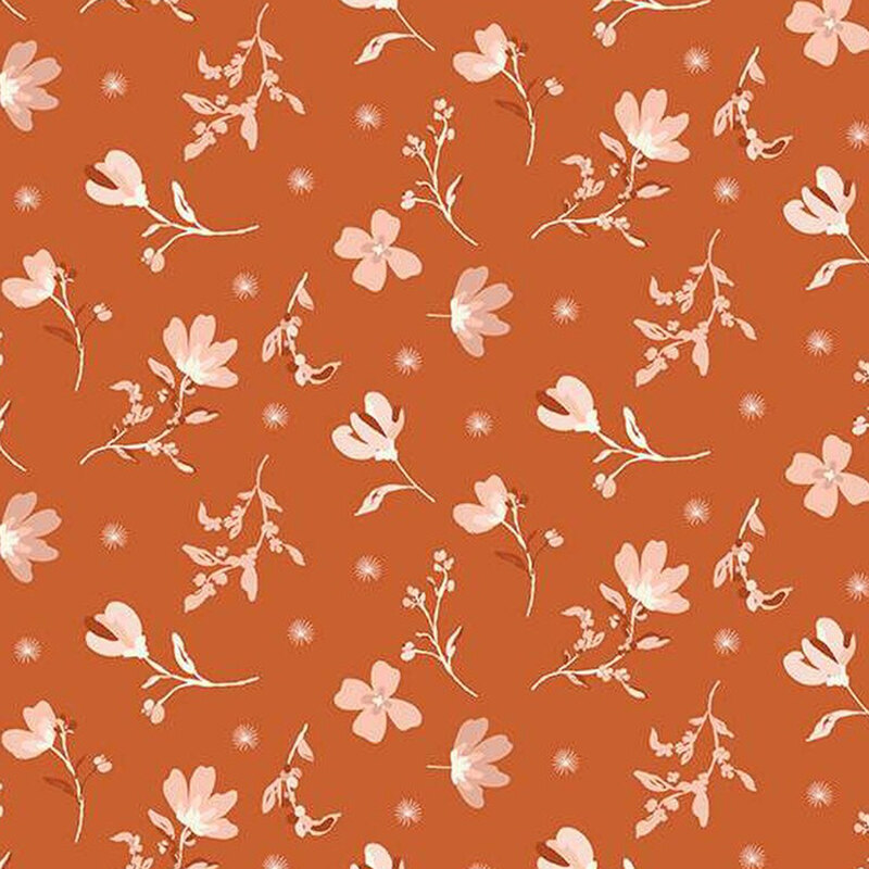 fabric pattern of white florals scattered all over a orange background