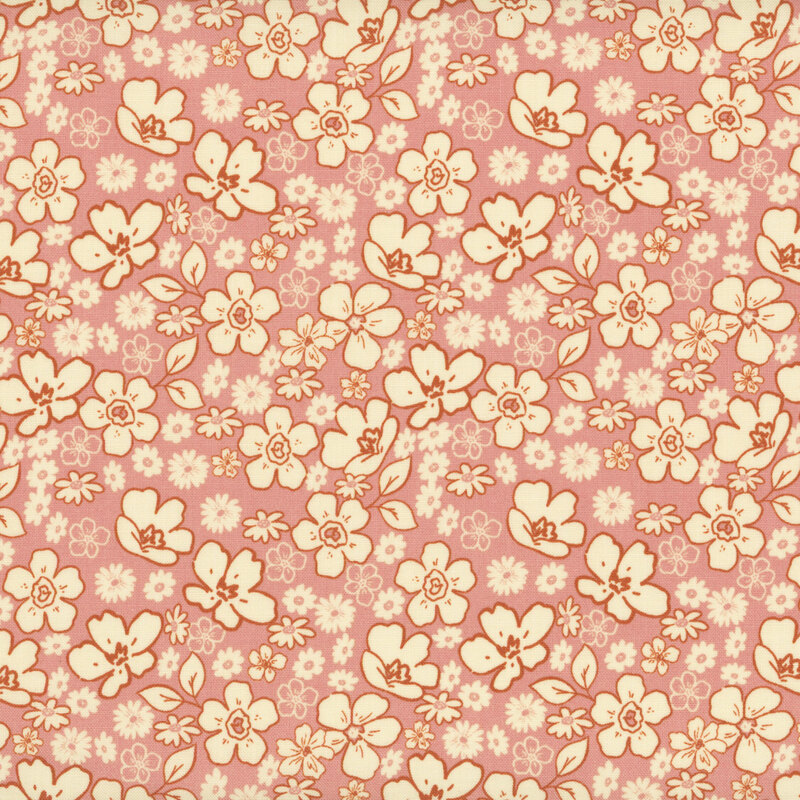 fabric pattern of white florals scattered all over a pink background.