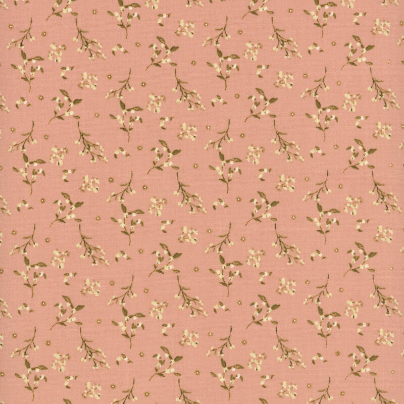fabric pattern of leaves and florals on a pink background.