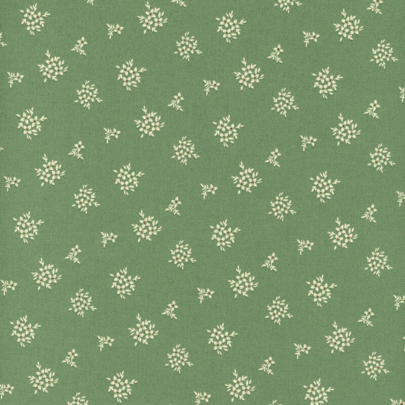 fabric pattern of floral bouquets on a green background.