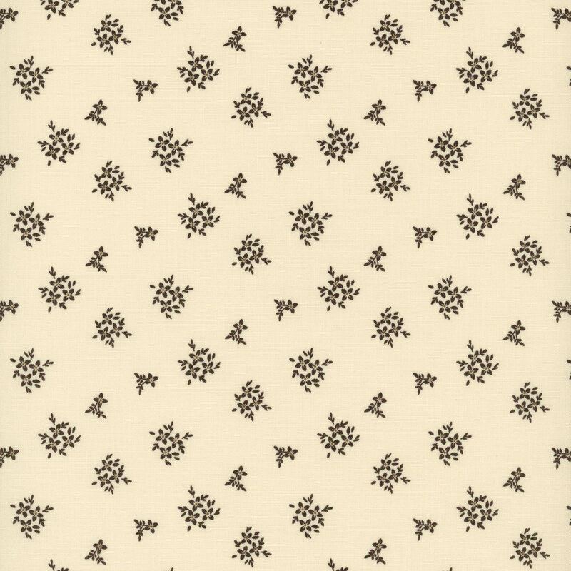 fabric pattern of floral bouquets on a cream background.