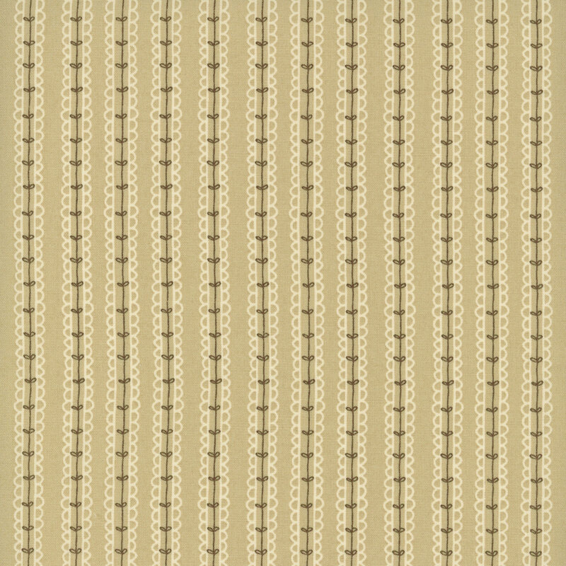 fabric of leaves on a vine in a stripped pattern all on a tan background.