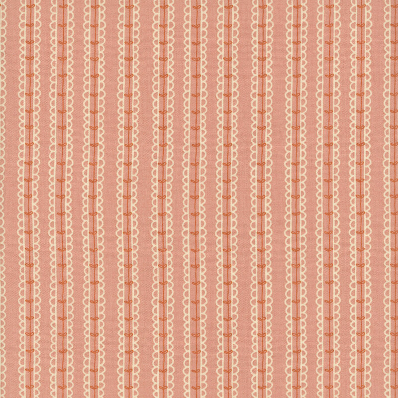 fabric of leaves on a vine in a striped pattern all on a pink background.