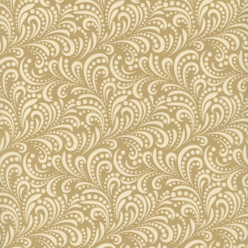 fabric pattern of white swirls on a tan background.