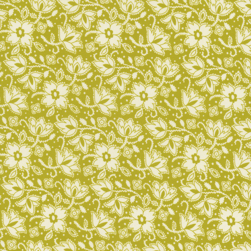 An olive green fabric pattern featuring white floral designs and swirling vines.