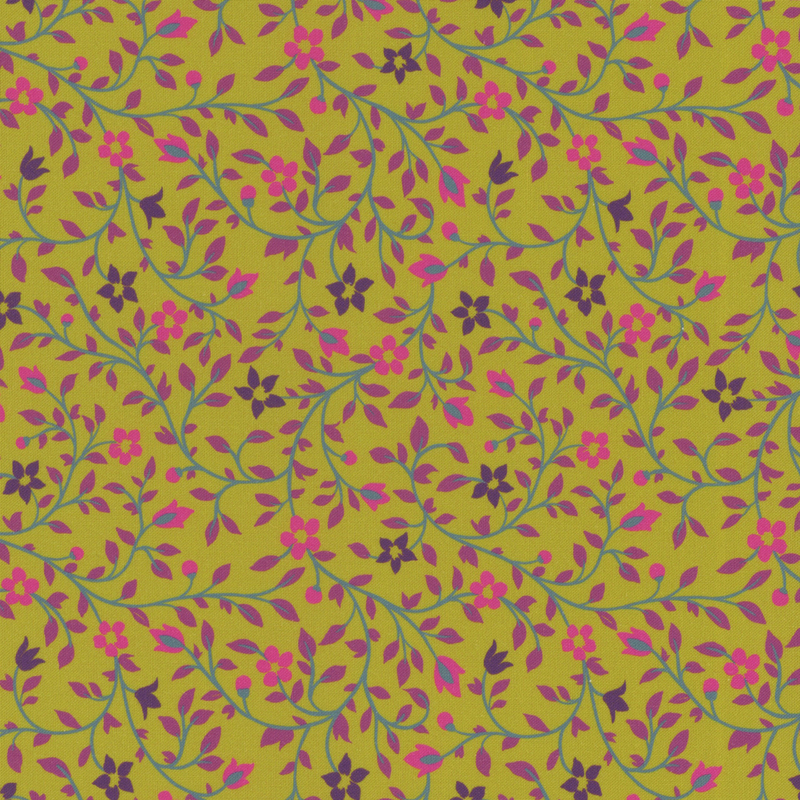 A brassy yellow fabric with intricate floral patterns in pink, purple, and green.