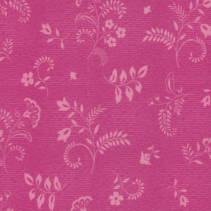 Textured vibrant pink fabric with light pink floral and leaf designs.