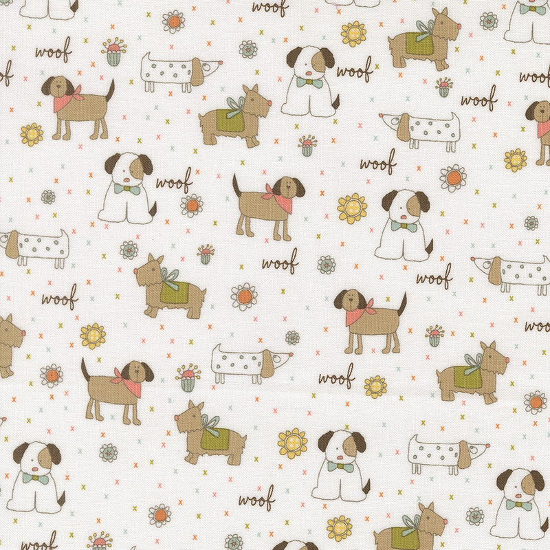 White fabric featuring various cartoon dogs surrounded by flowers and the word woof.