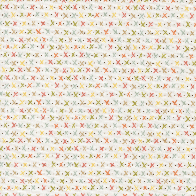 A repetitive pattern of small colorful X shapes in red, yellow, and green on a white background.