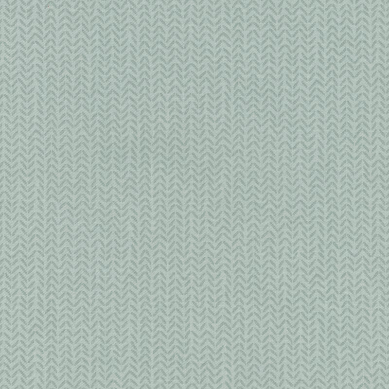 Tonal light aqua fabric with a subtle repeating herringbone pattern