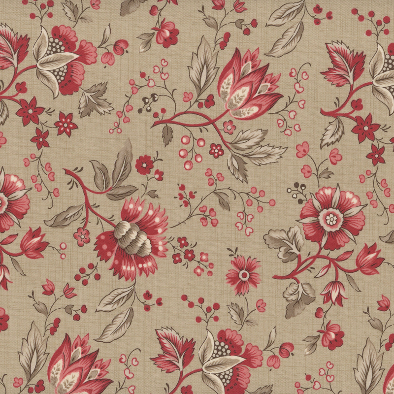 fabric pattern of red florals spread on a tan background