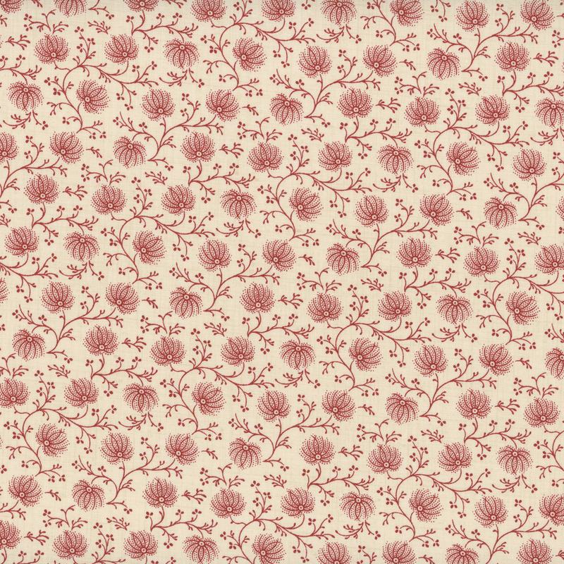 fabric pattern of red florals on a cream background