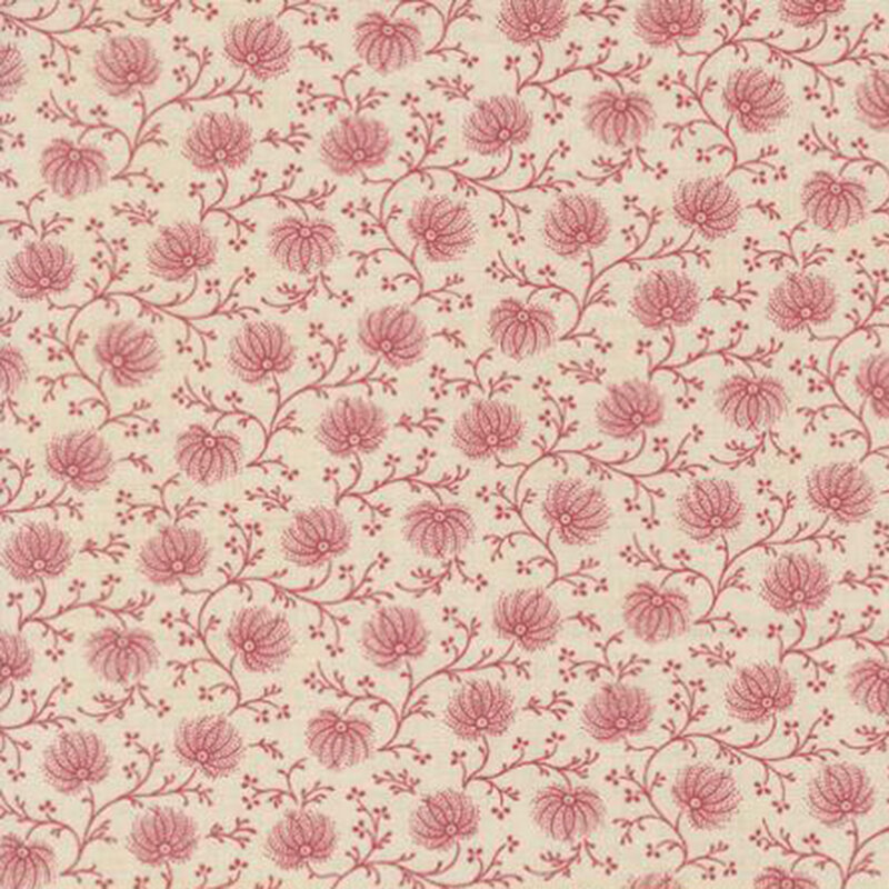 fabric pattern of red florals on a cream background