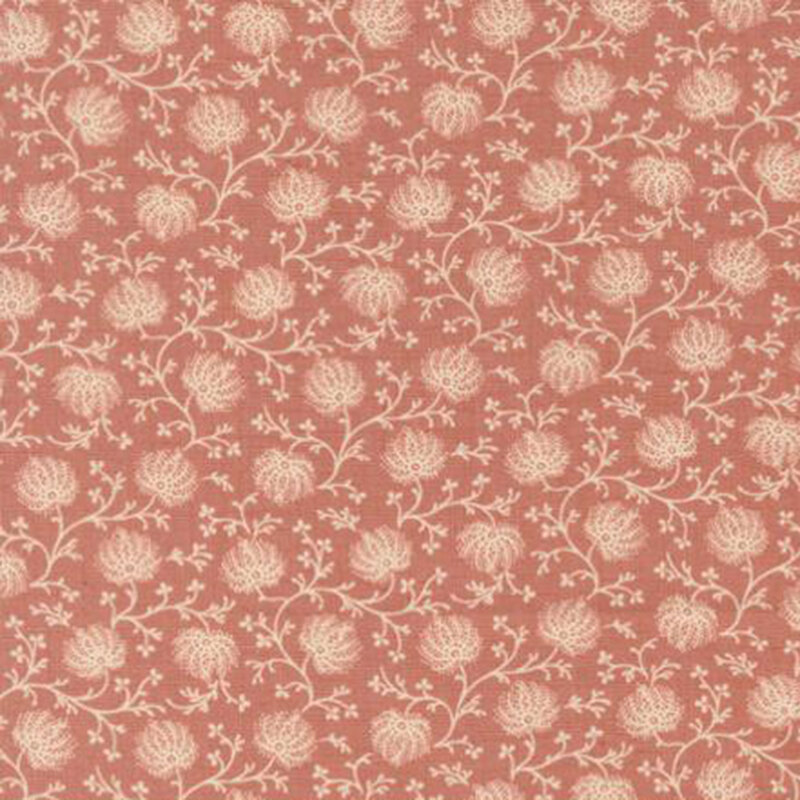 fabric pattern of florals over a soft red background