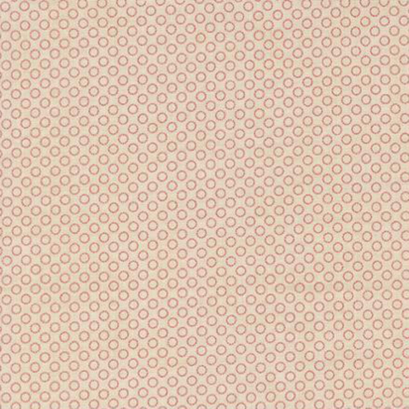 fabric pattern of circles all over a cream background