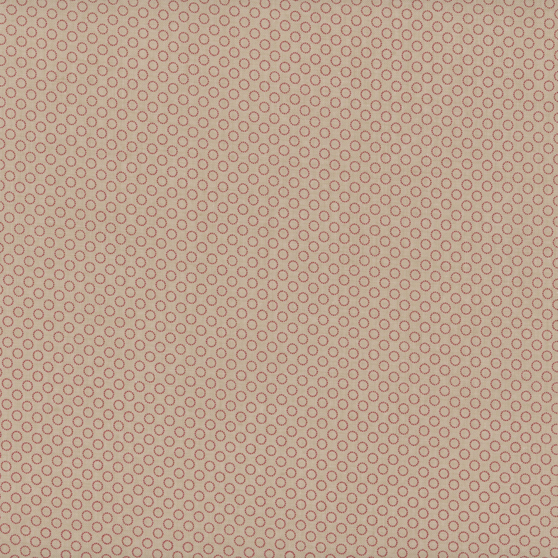 fabric pattern of circles all over a tan background