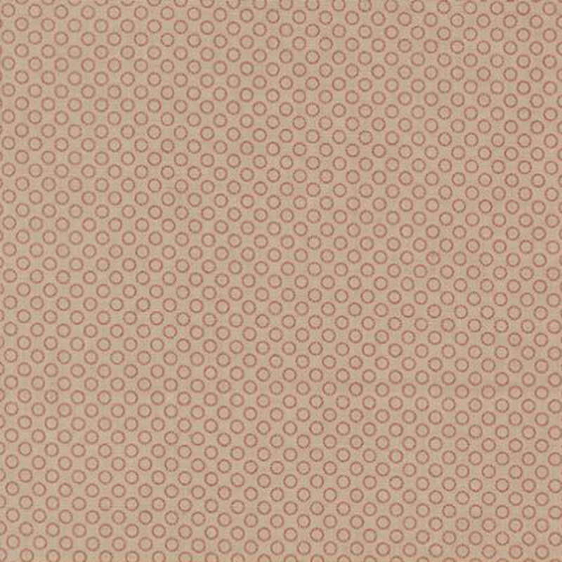 fabric pattern of circles all over a tan background