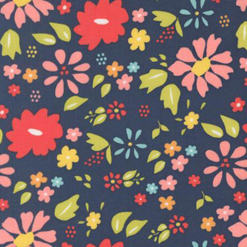 fabric pattern of florals spread over a navy background