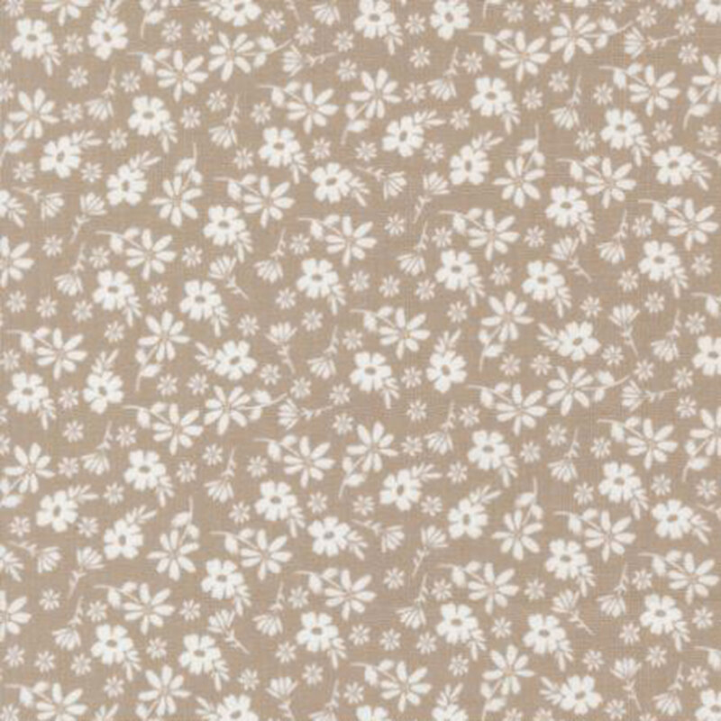 fabric pattern of florals spread over a brown background