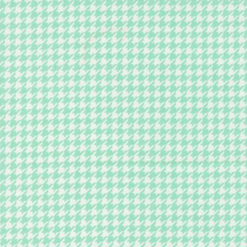 fabric pattern of an teal and white houndstooth pattern