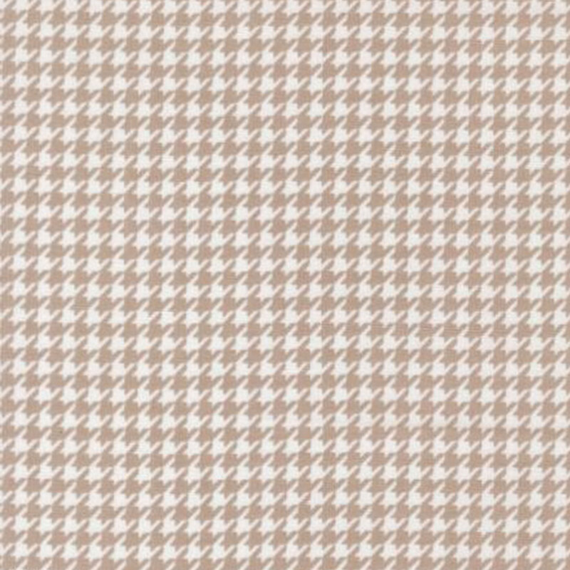 fabric pattern of an brown and white houndstooth pattern