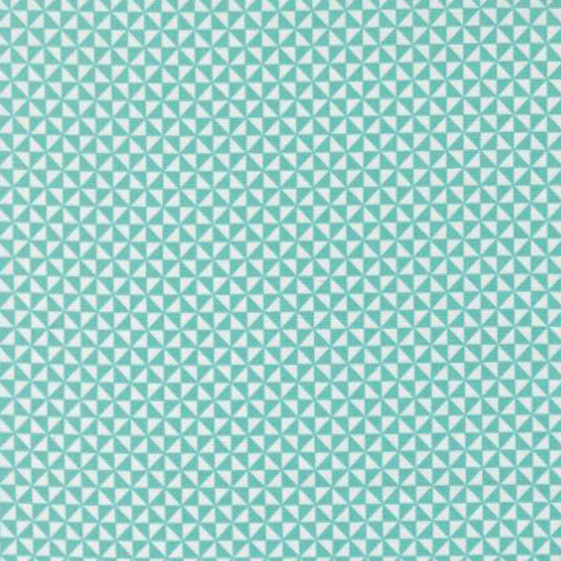 fabric pattern of small triangles in shades of teal and white