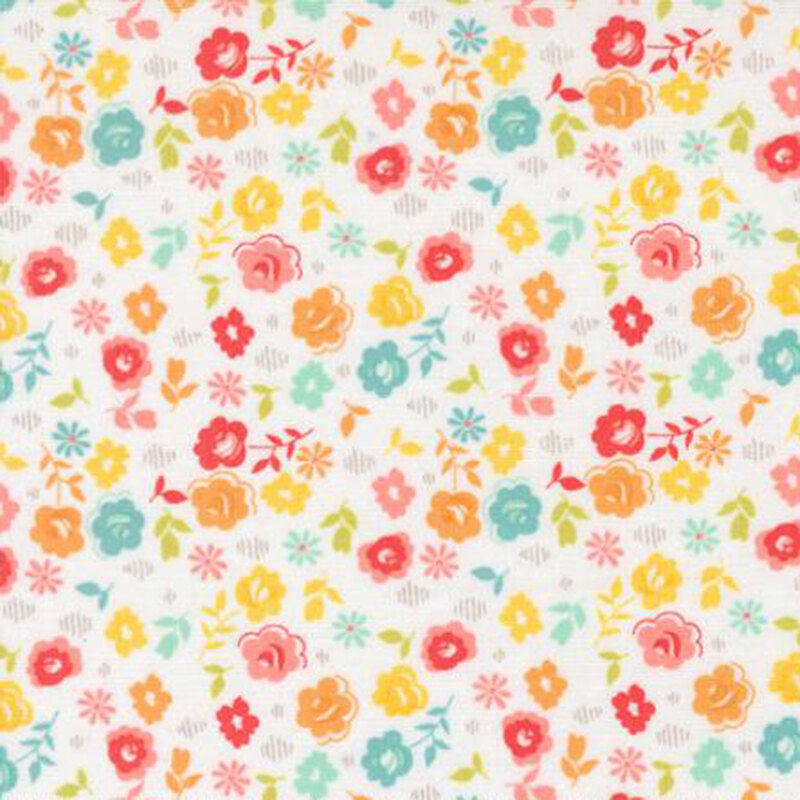 fabric pattern of flowers scattered all over a white background