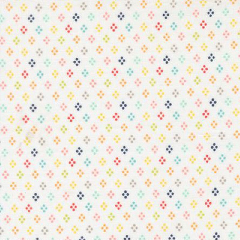 fabric pattern of colorful motifs all over a white background