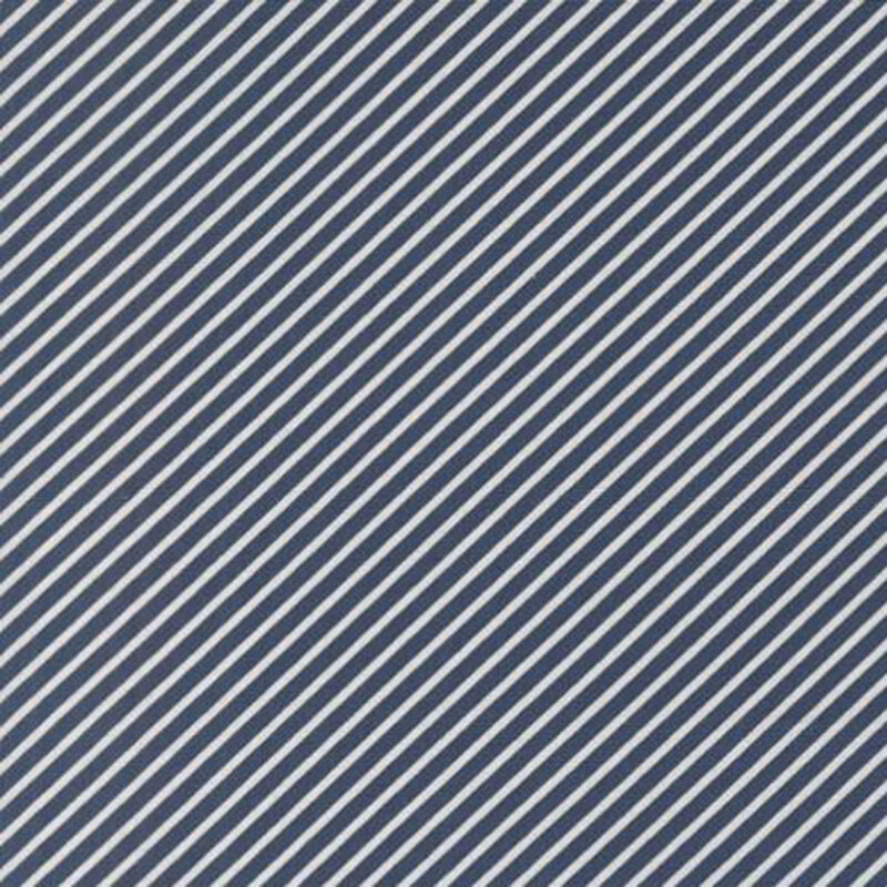 fabric pattern of white strips in a diagonal direction on a navy background